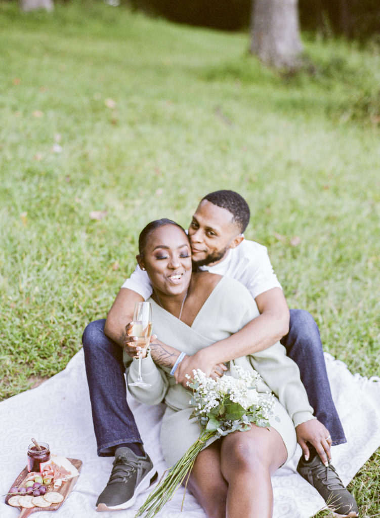 engage couple during their engagement session at Senece Park